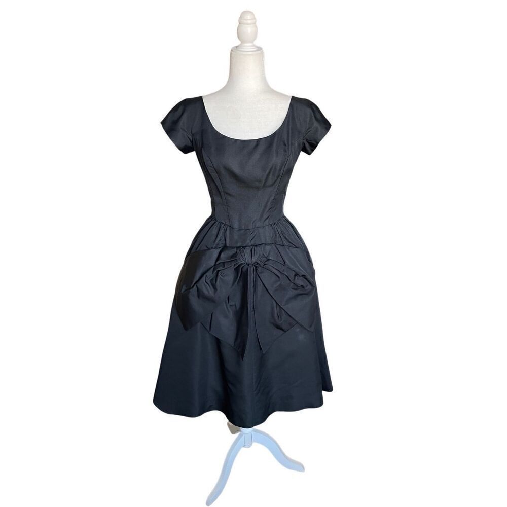 Vintage Gus Mayer 60s black cocktail flared out bow front cocktail dress
